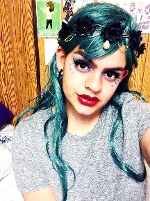 Mya in 2017, fighting boredom by playing with an elf-vibe look